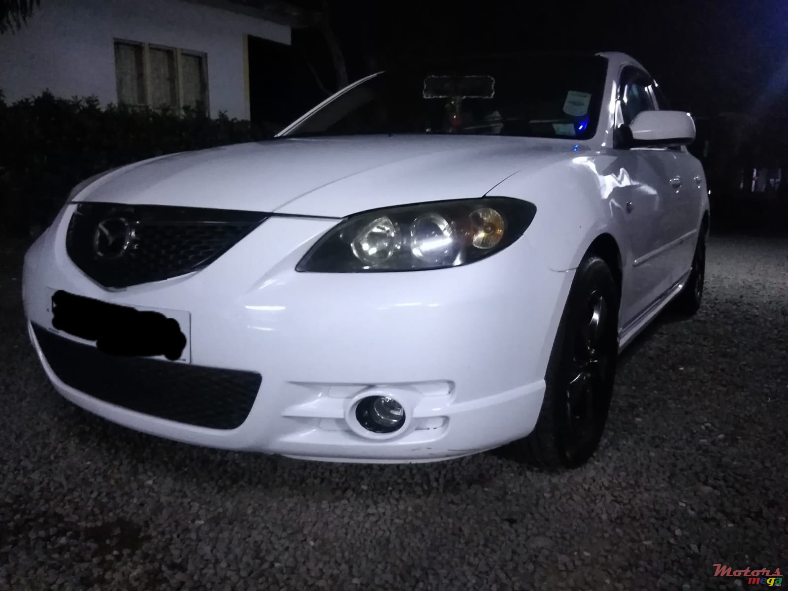 2004' Mazda 3 photo #1