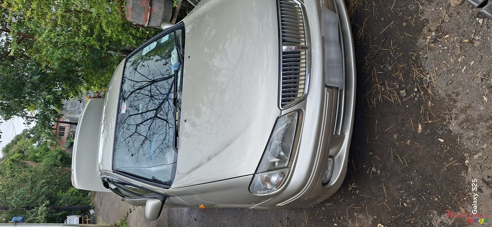 2002' Nissan Sunny photo #1