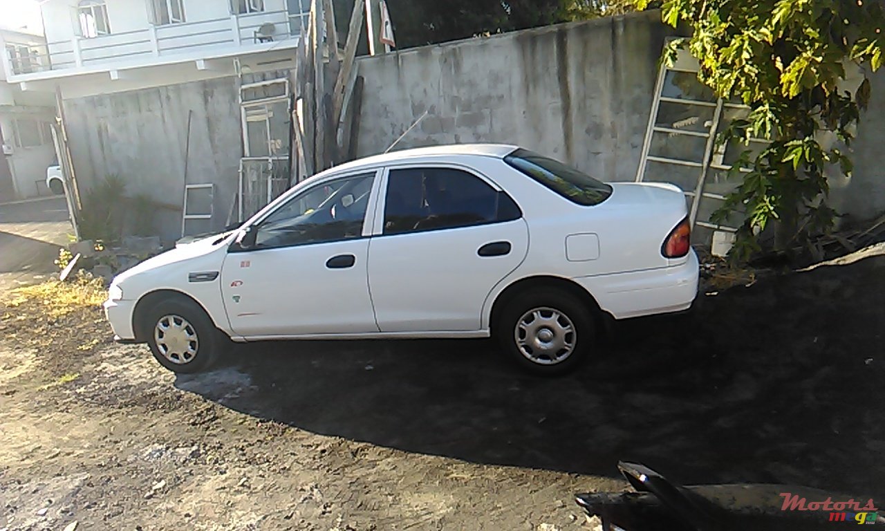 1998' Mazda 323 photo #1