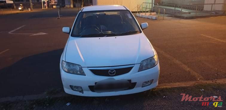 2002' Mazda 323 1324 cc photo #2