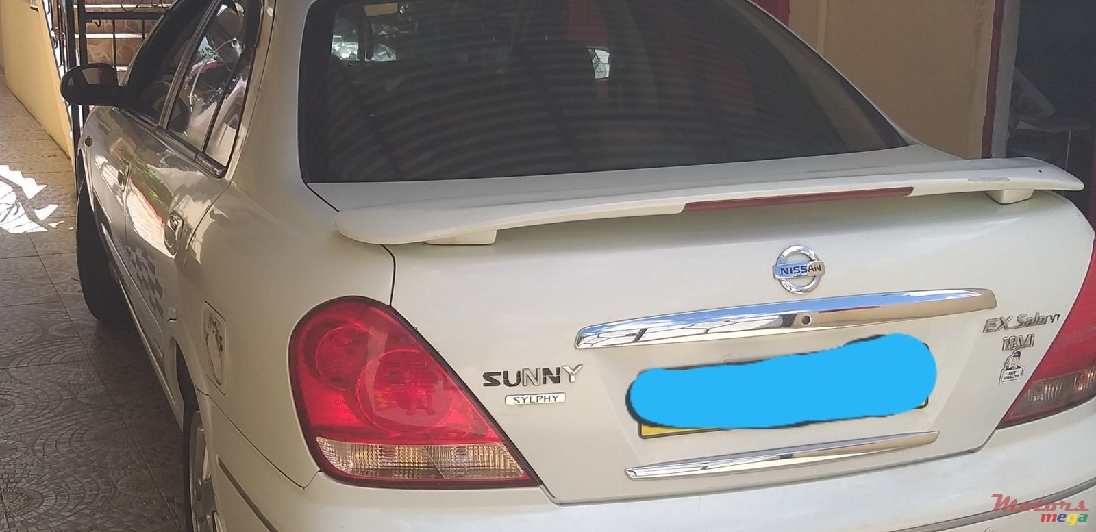 2004' Nissan Sunny photo #1