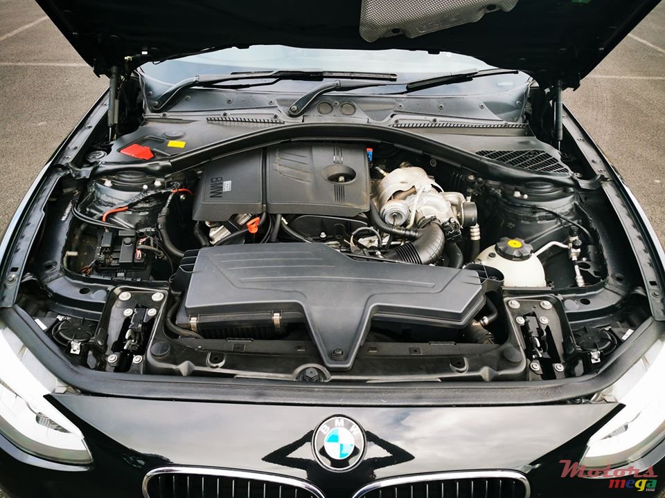 2011' BMW 116 i photo #6