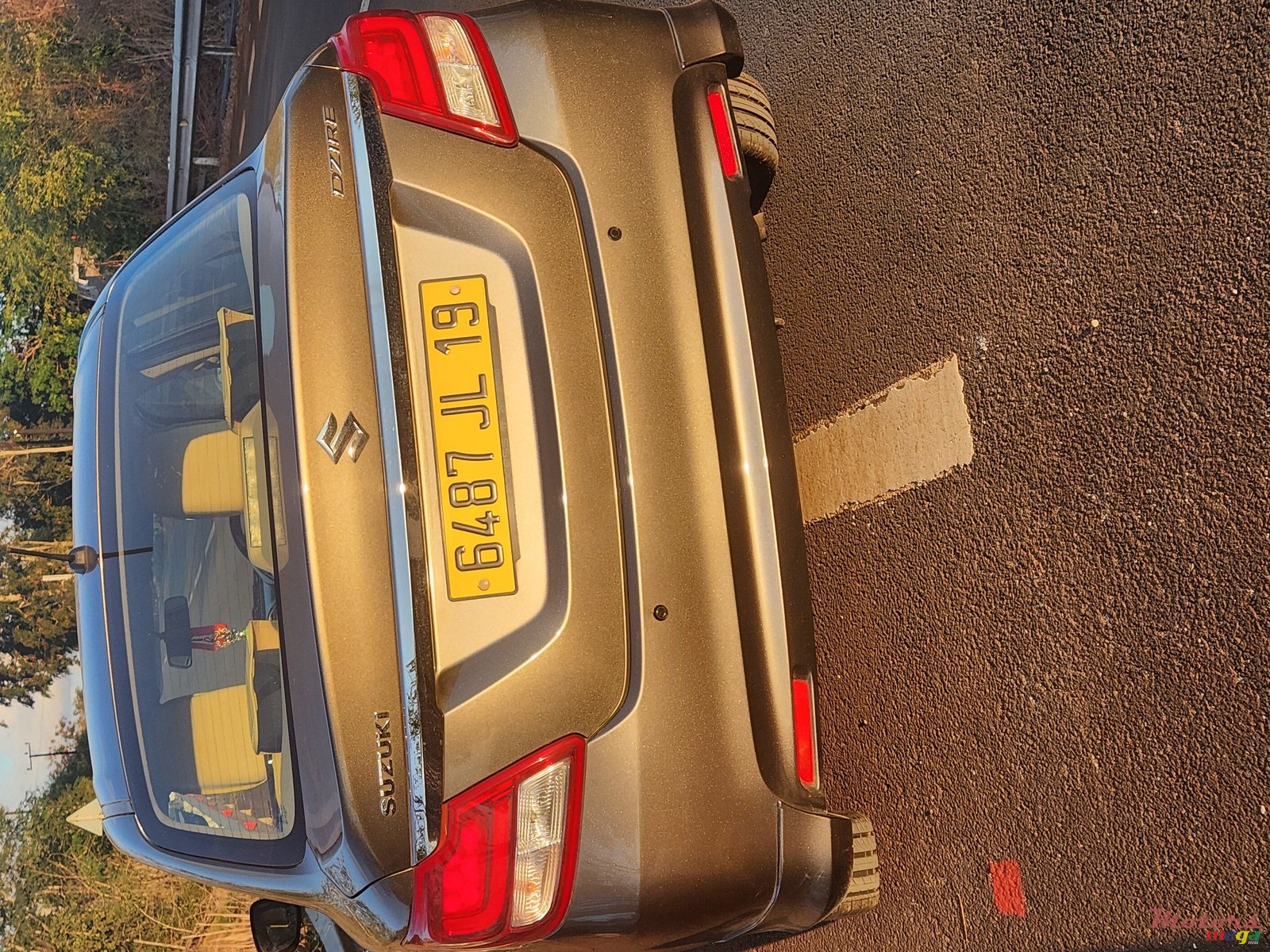 2019' Suzuki Swift Dzire photo #1