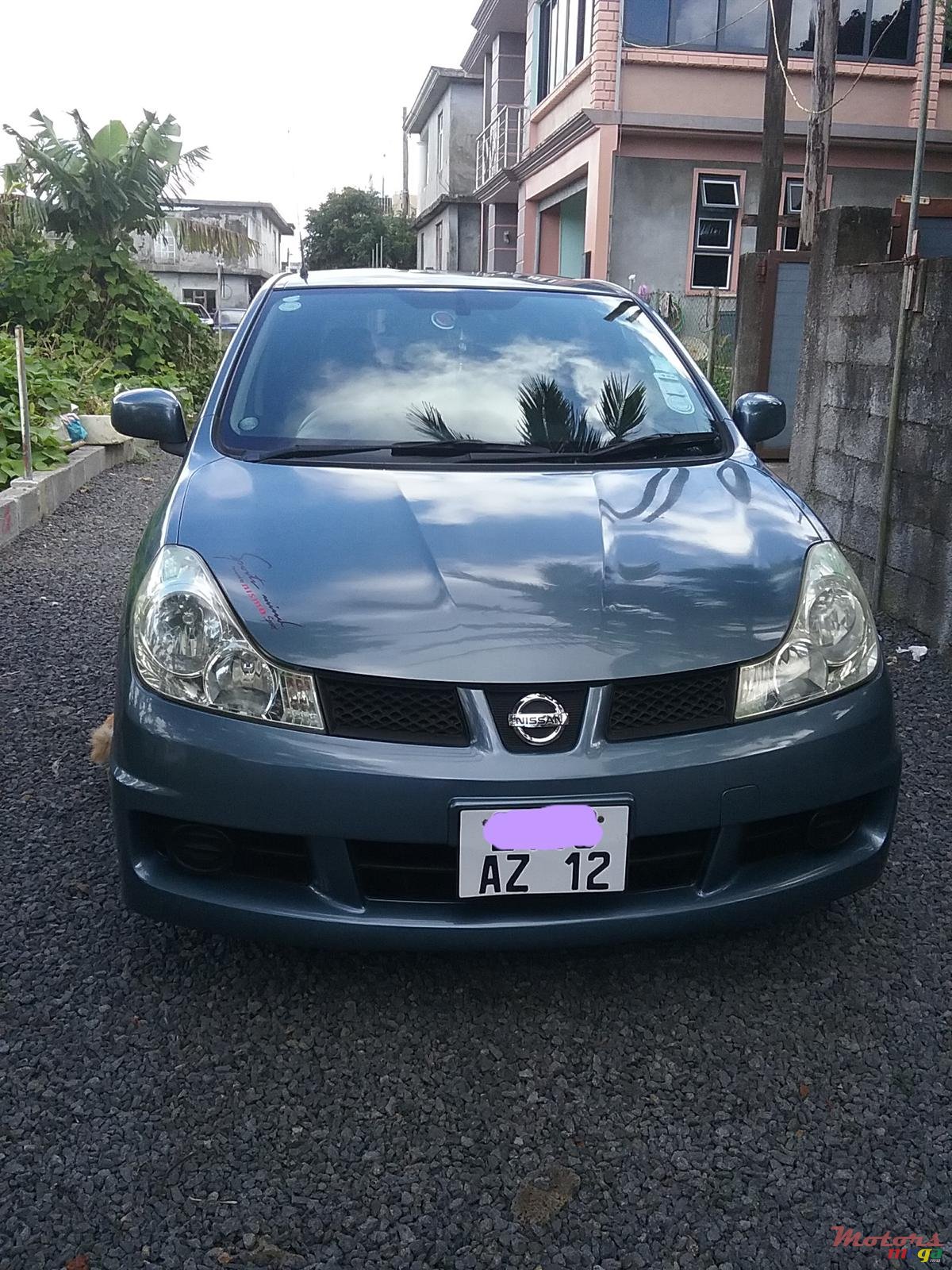 2012' Nissan Wingroad photo #1