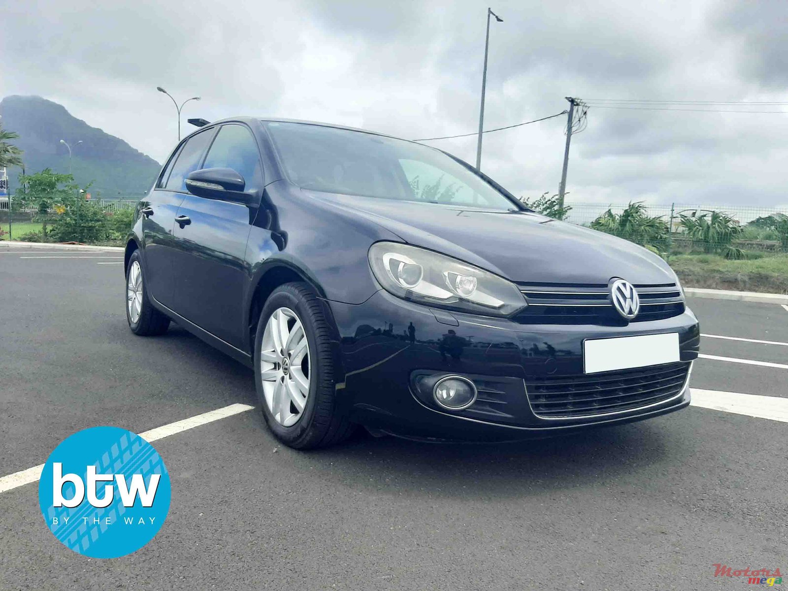 2011' Volkswagen Golf VI photo #1