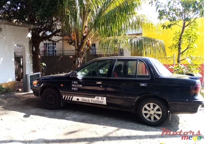1990' Mitsubishi Lancer photo #2