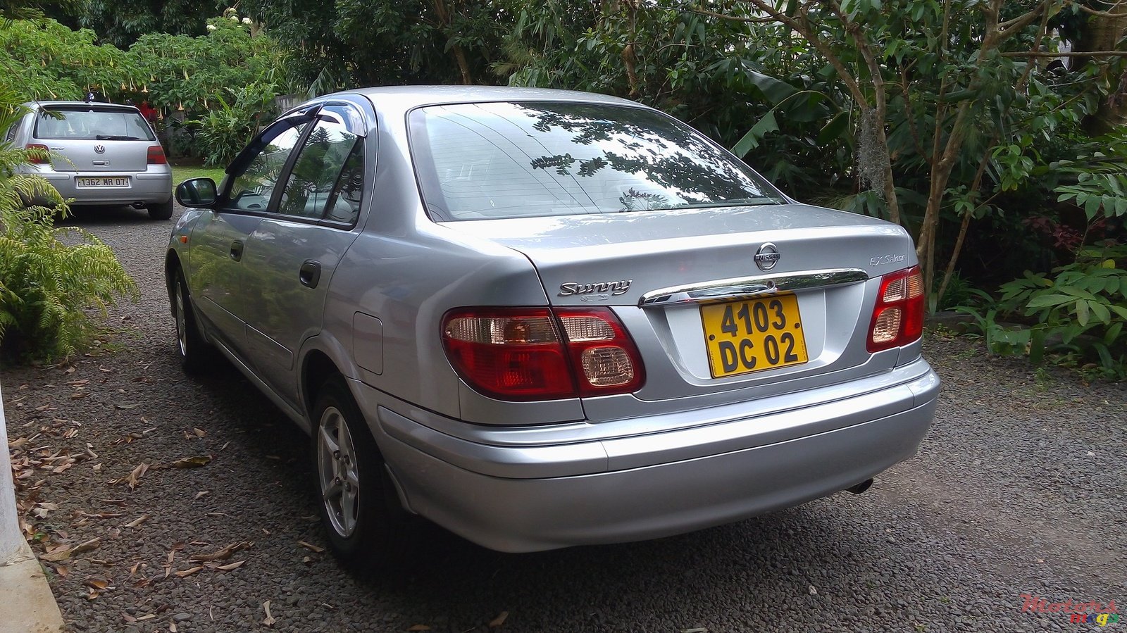 2002' Nissan Sunny photo #1