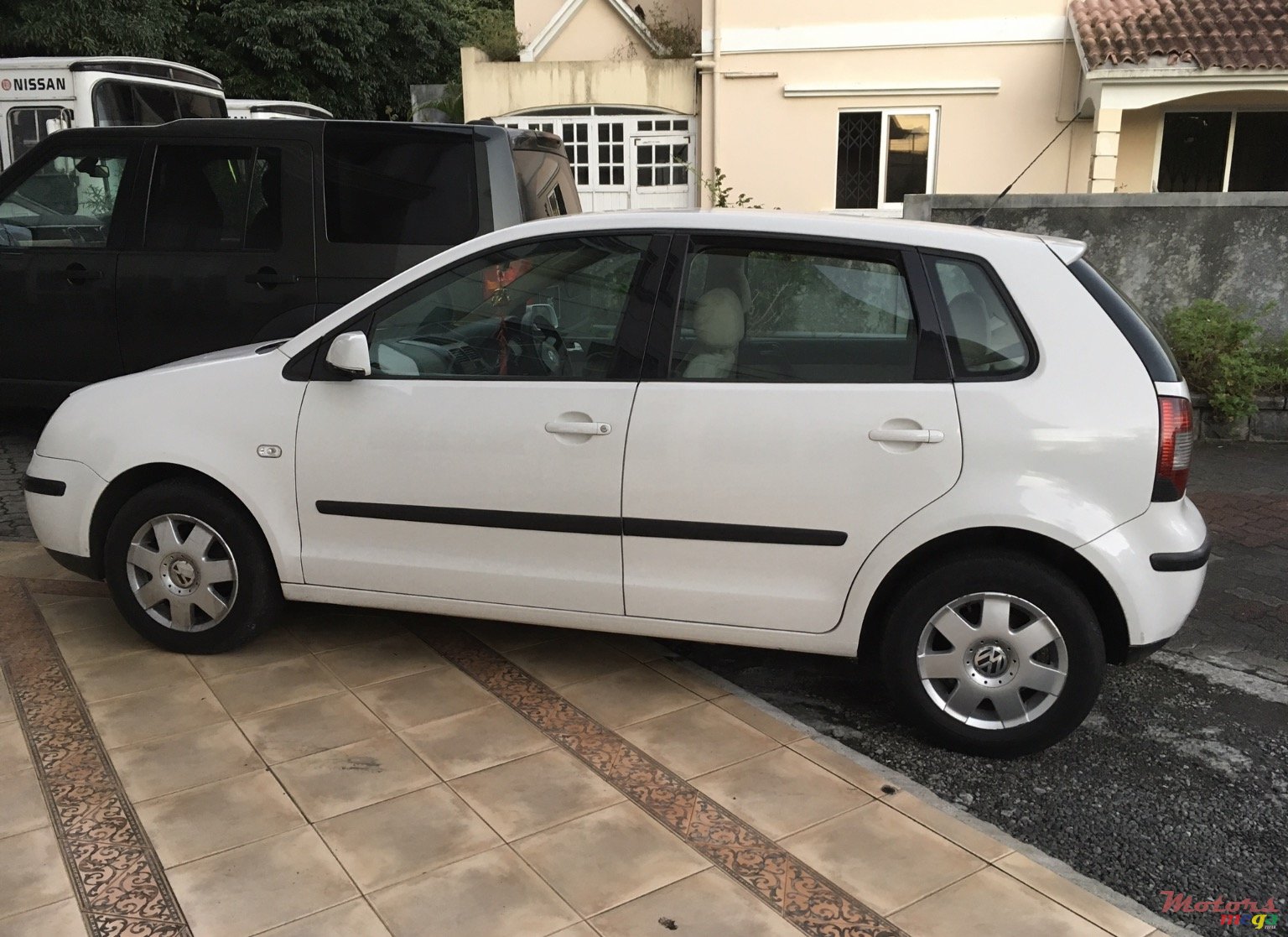 2004' Volkswagen Polo photo #1