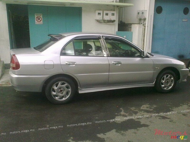 1997' Mitsubishi Lancer jante cosmic photo #3