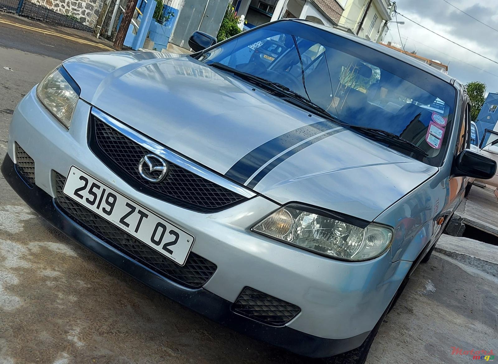 2002' Mazda Familia Dorigin photo #1