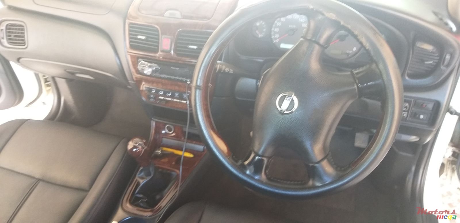 2004' Nissan Sunny photo #7