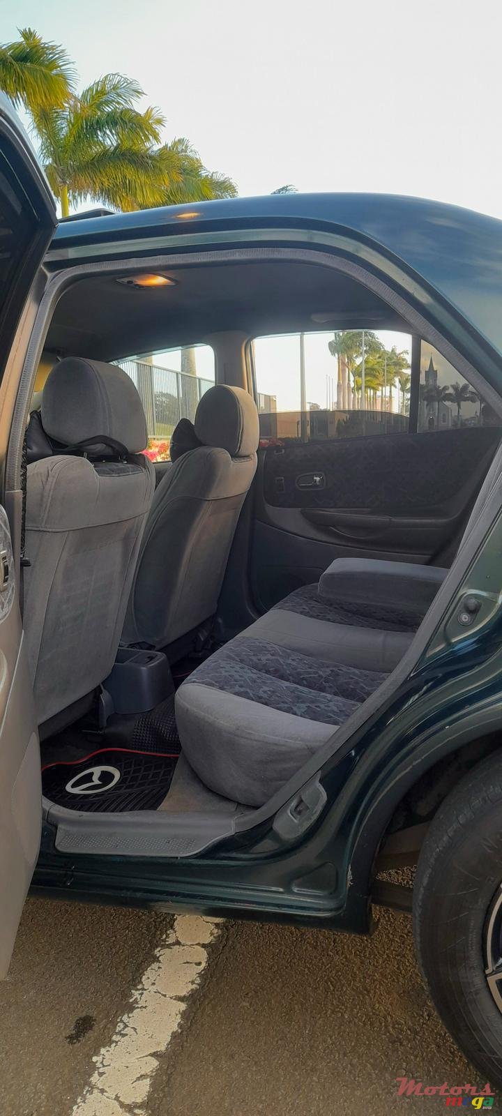 2000' Mazda 323 photo #6