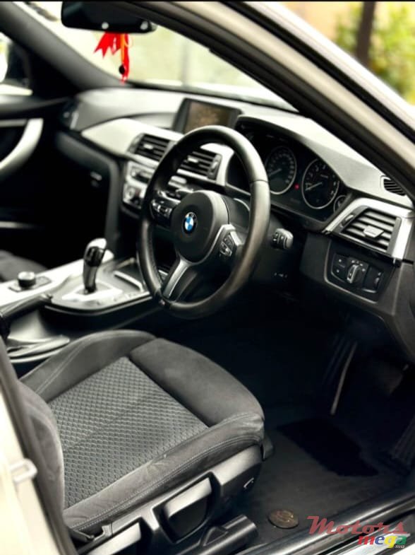 2015' BMW 318 photo #6