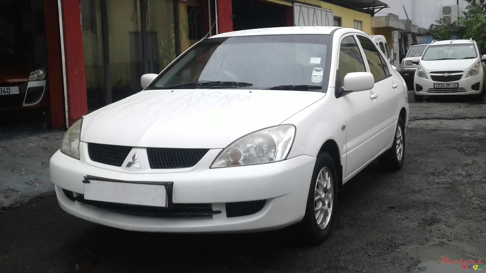 2009' Mitsubishi Lancer GLX photo #1