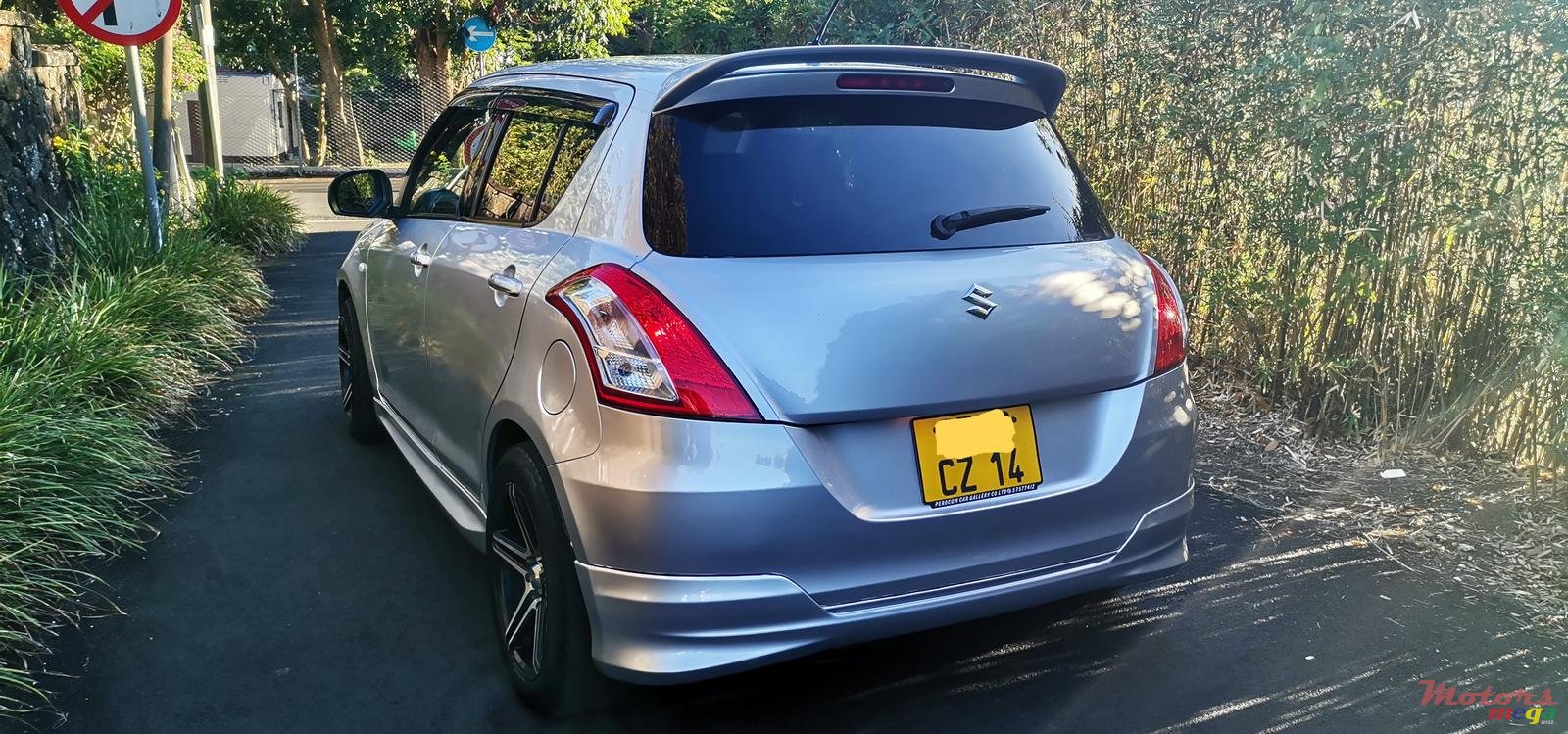 2014' Suzuki Swift photo #7