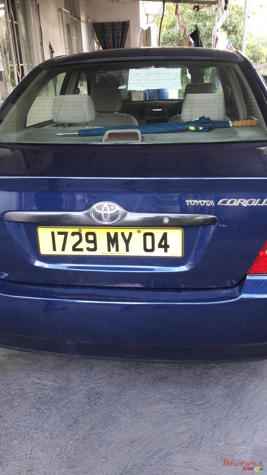 2004' Toyota Corolla photo #1