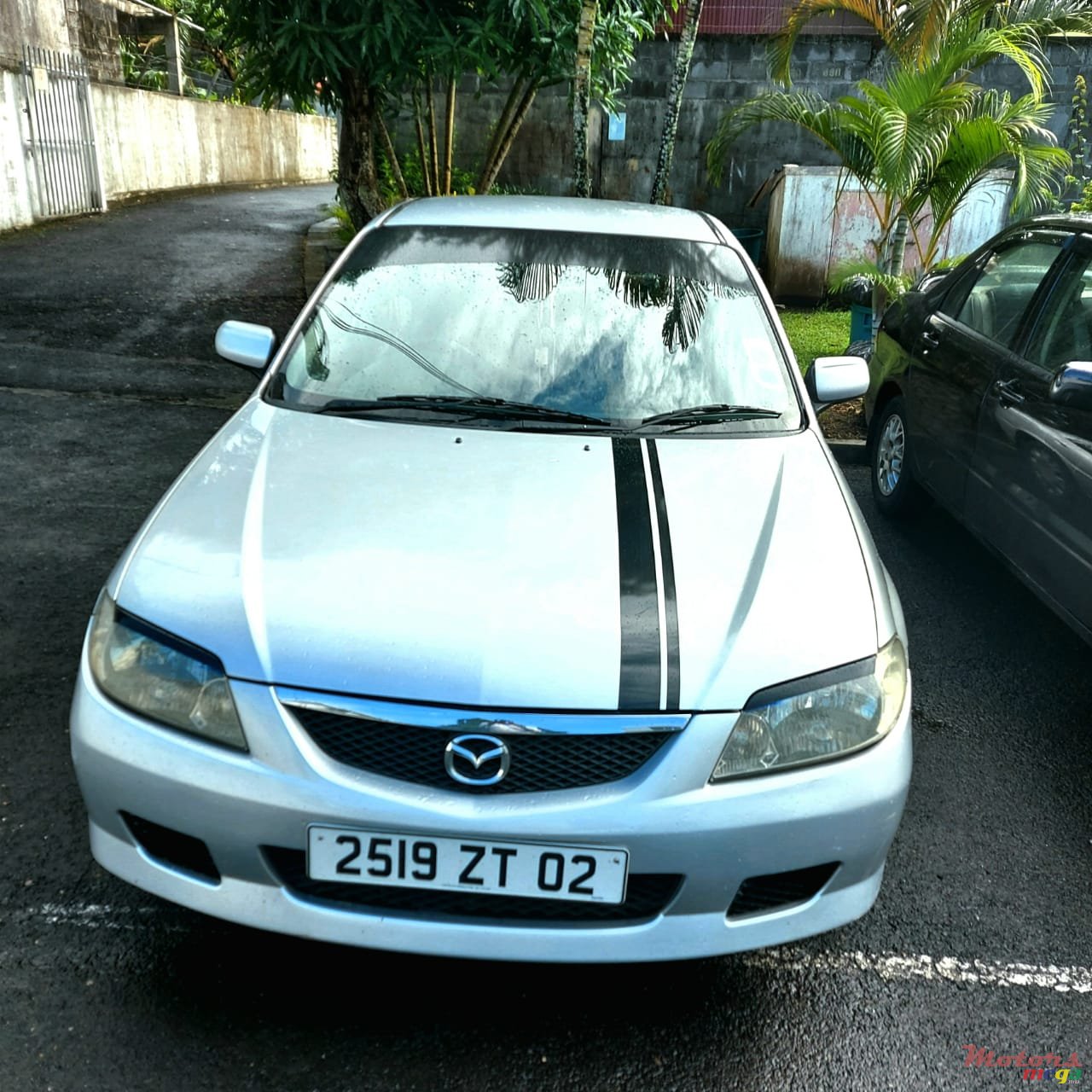 2002' Mazda Familia Dorigine photo #1