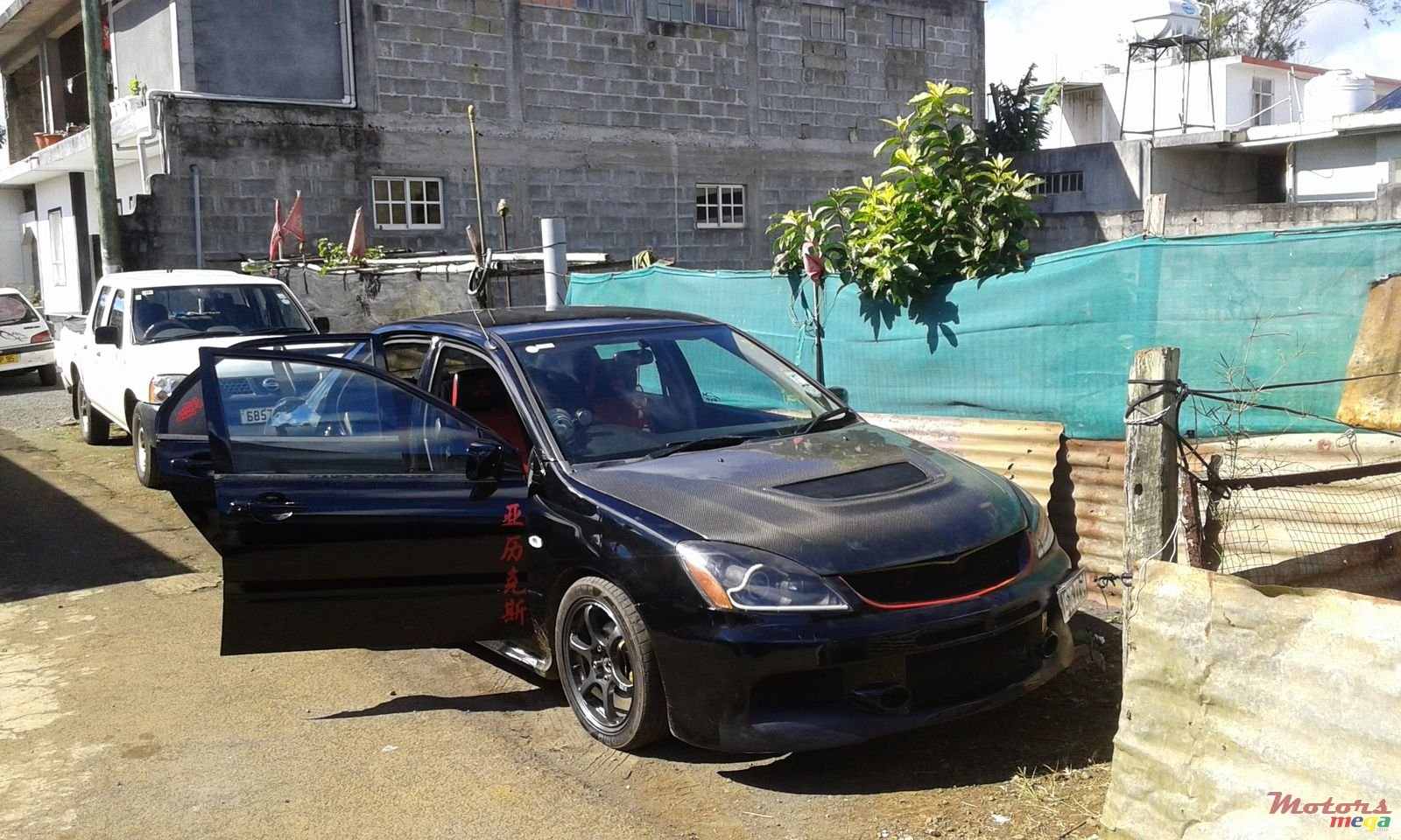 2004' Mitsubishi Lancer photo #1