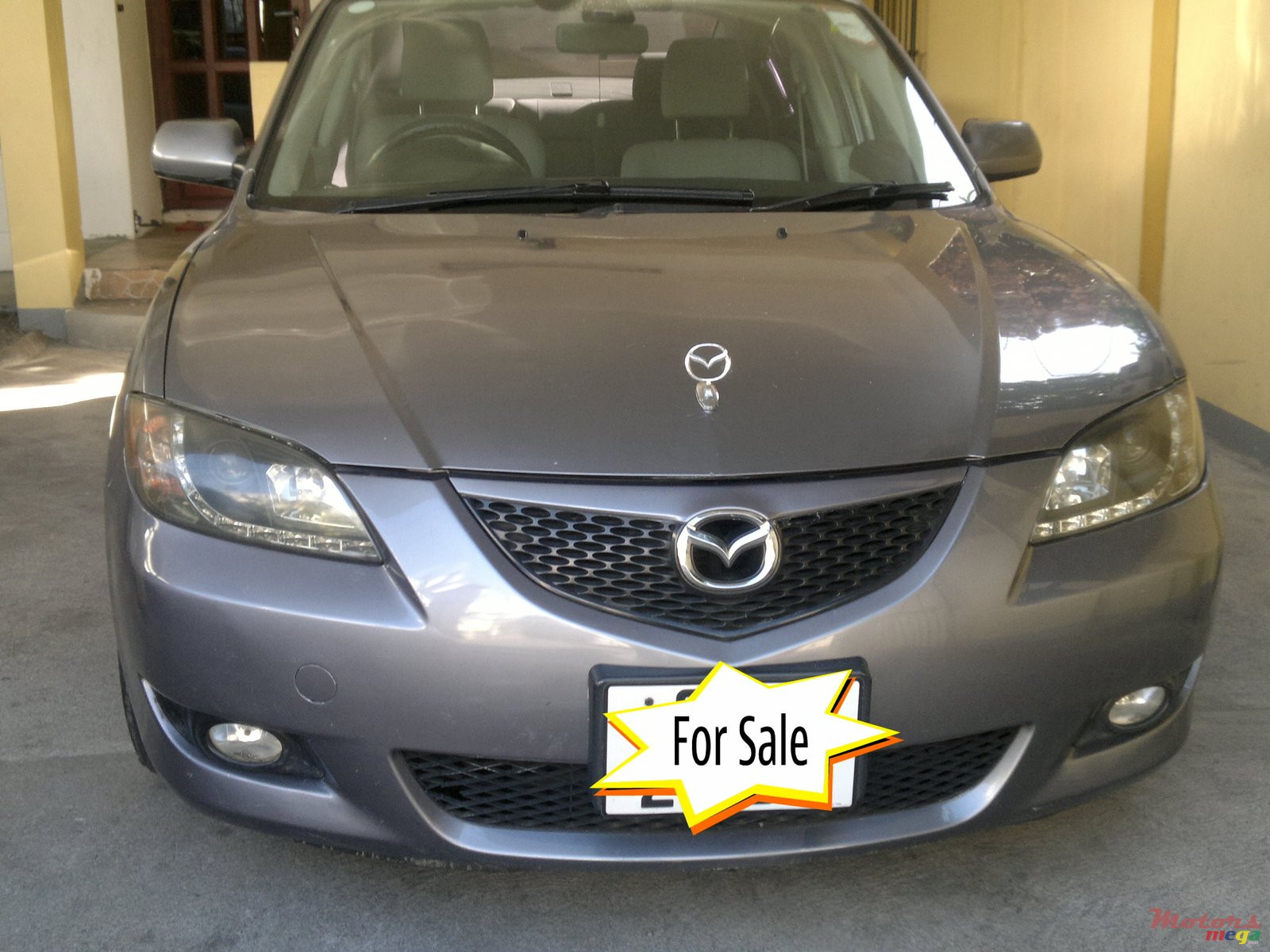 2003' Mazda 3 sedan photo #1