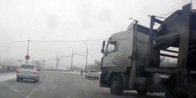 Watch this Shocking Car Transporter Crash Captured on Dashcam