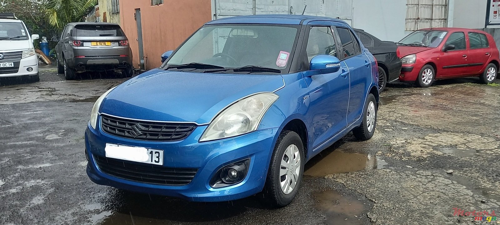 2013' Suzuki Swift Dsire photo #2