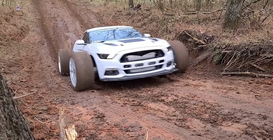 Watch Crazy Ford MUDstang Vs Regular Mustang In Hill Climb Duel