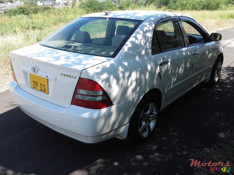 2003' Toyota Corolla Nze gradeX- G edition photo #3