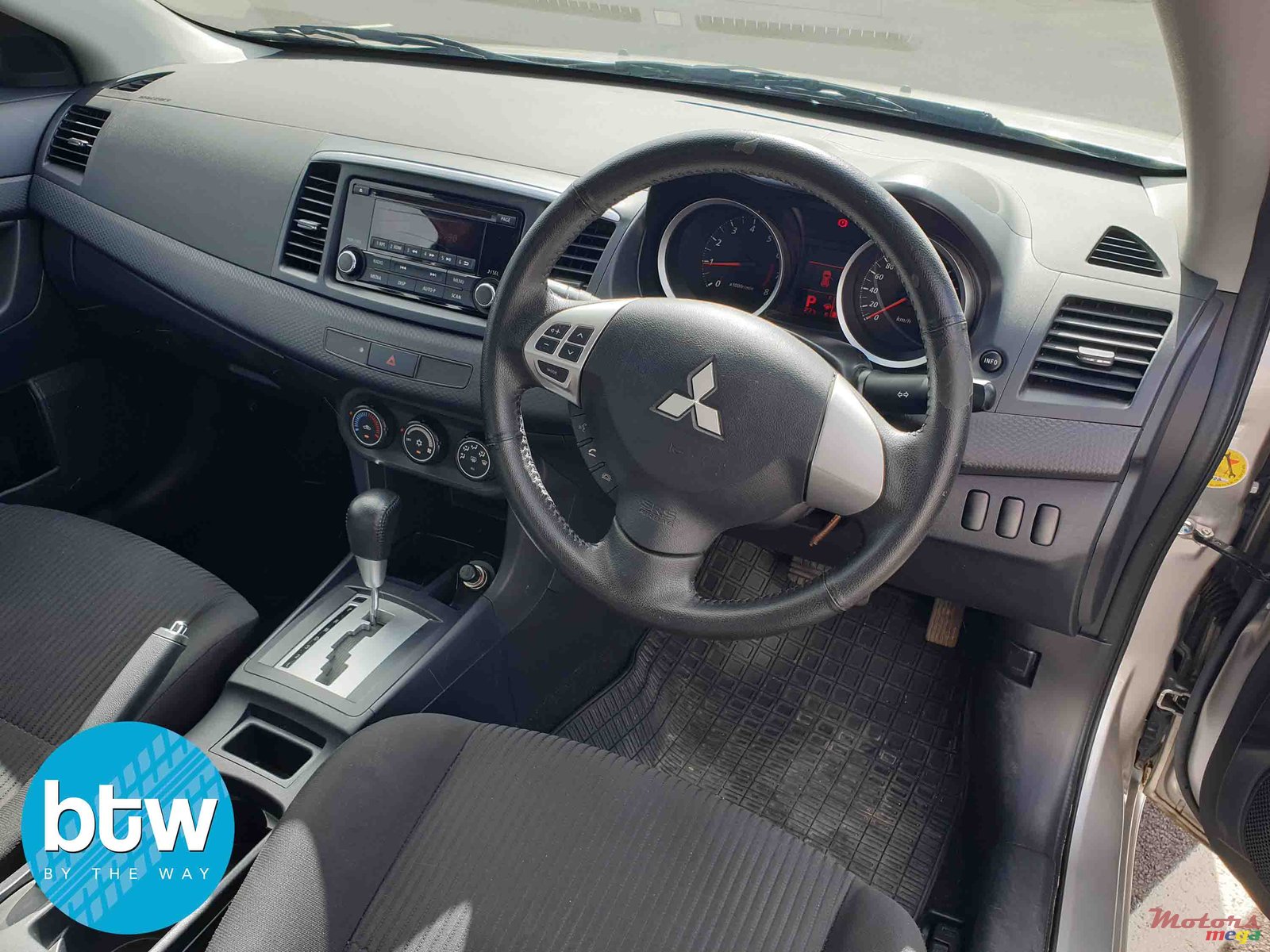 2014' Mitsubishi Lancer Ex photo #6