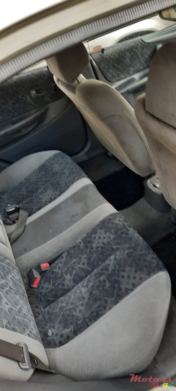 1999' Mazda 323 photo #6