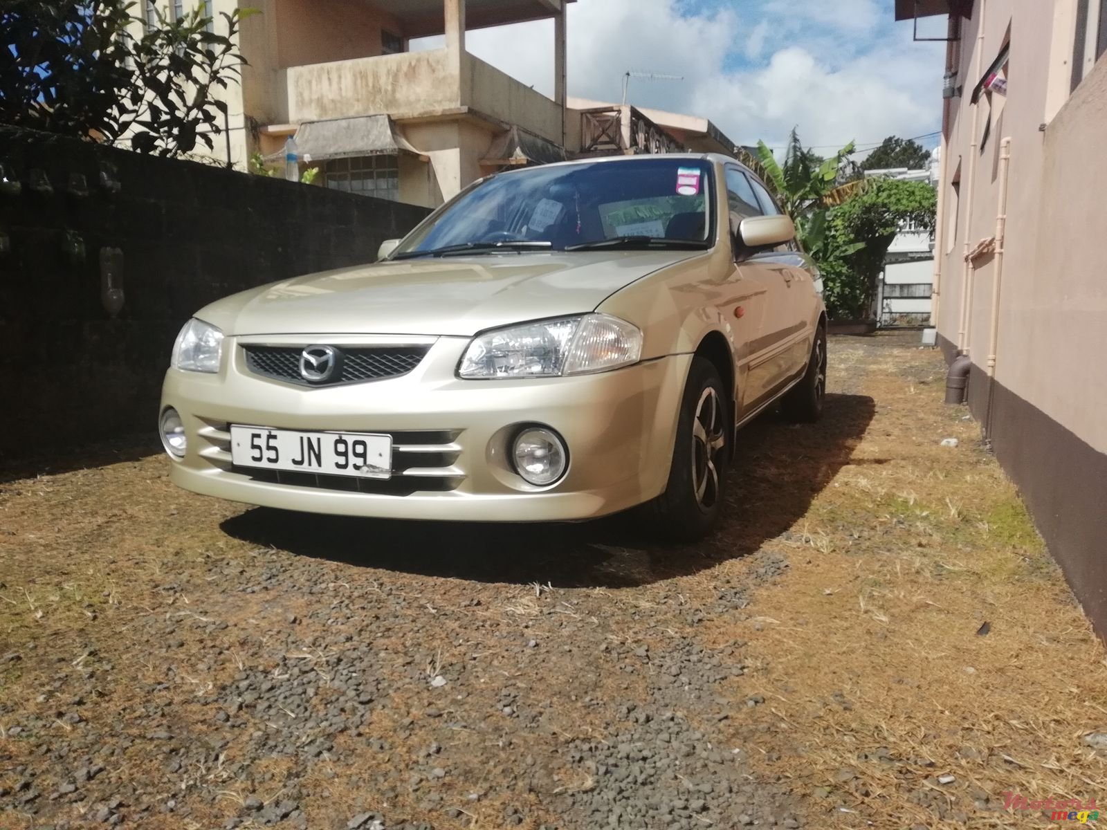 1999' Mazda 323 photo #1