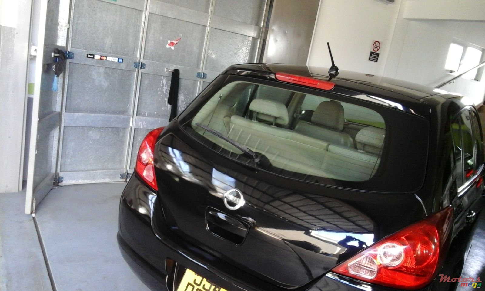 2005' Nissan Tiida photo #2