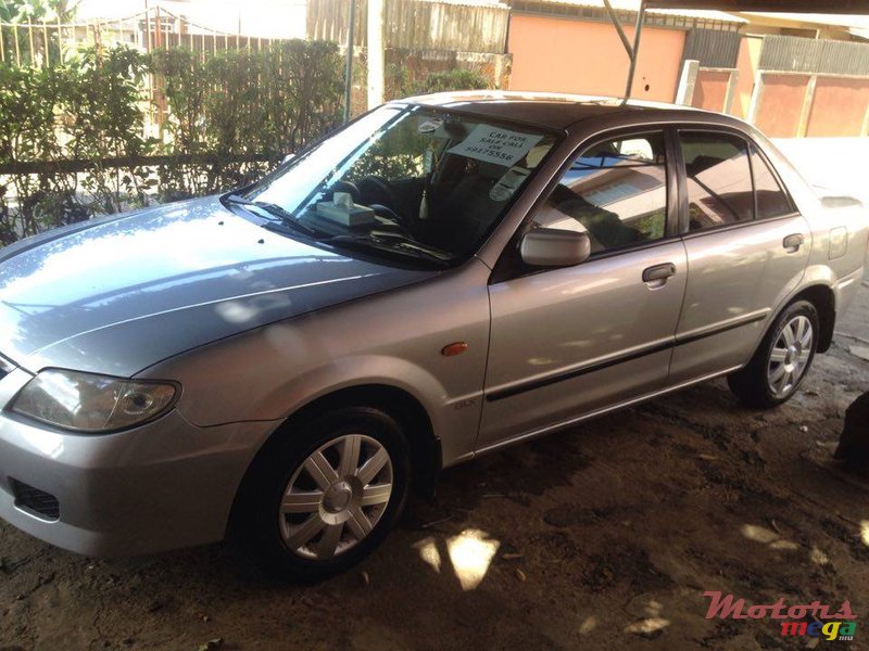 2002' Mazda 323 photo #1