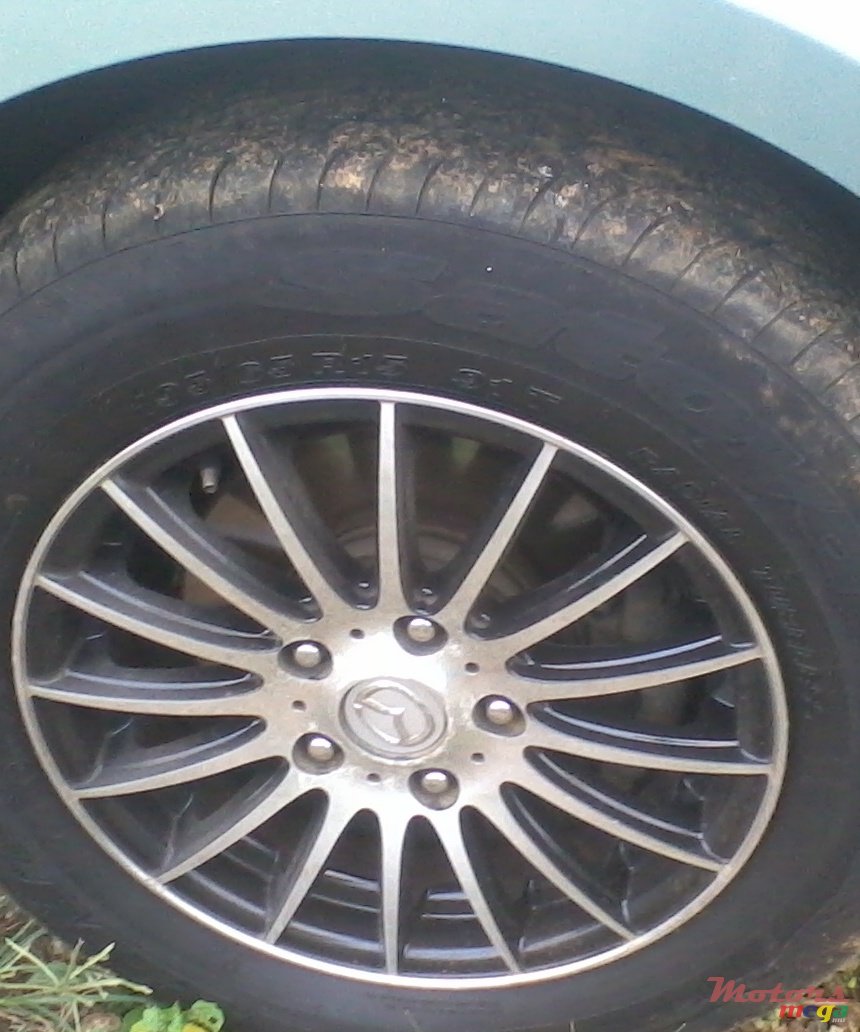 2004' Mazda 3 photo #6