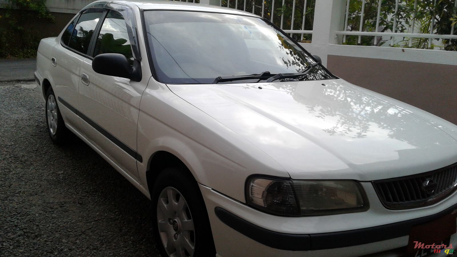 1999' Nissan Sunny automatic photo #1