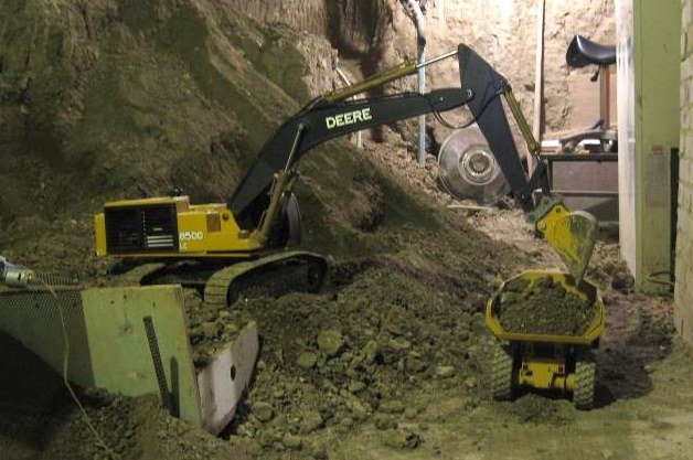 Canadian Takes Over Seven Years to Dig Out Basement Using R/C Construction Equipment