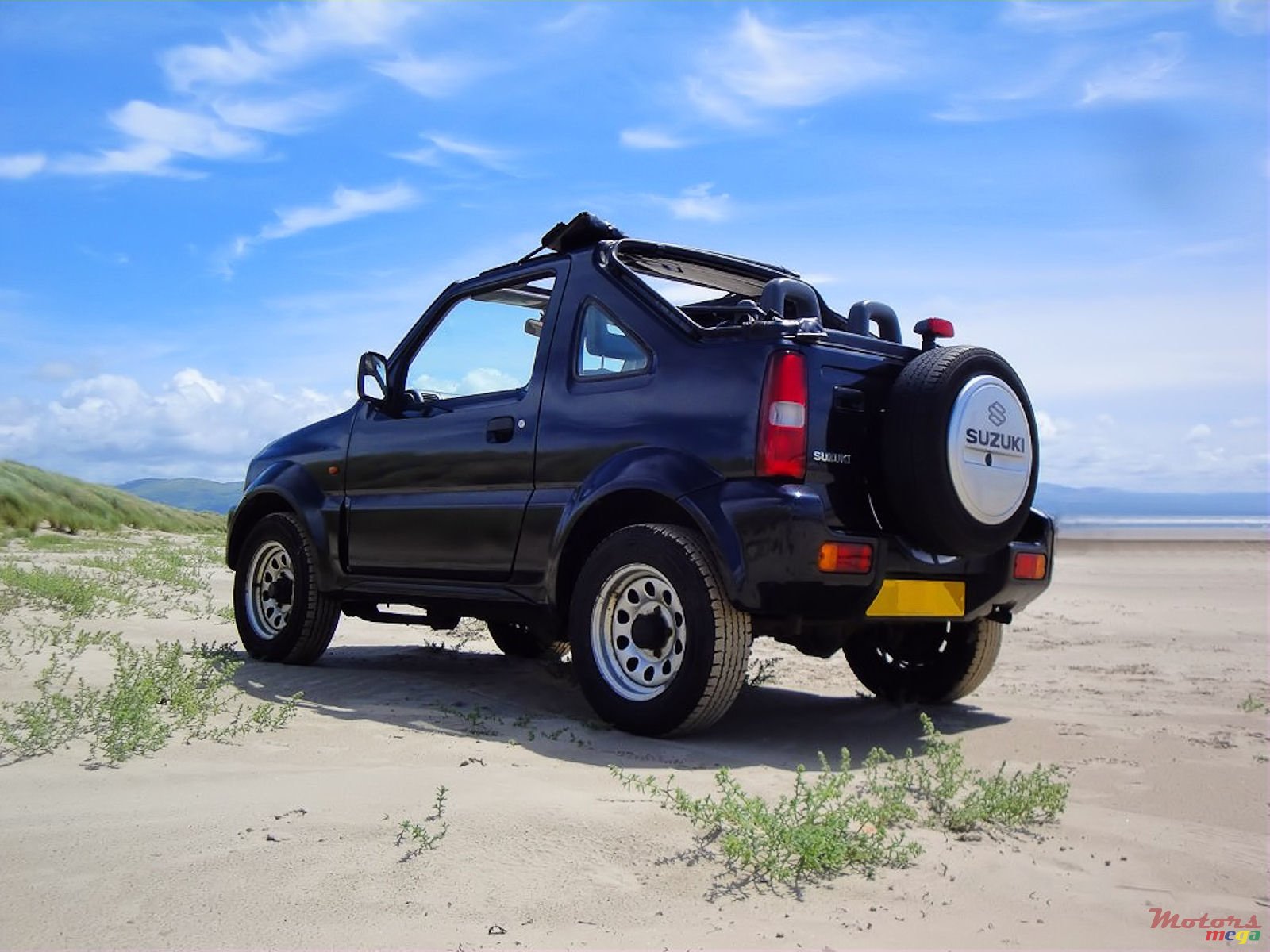 2002' Suzuki Jimny Convertible 4x4 photo #1