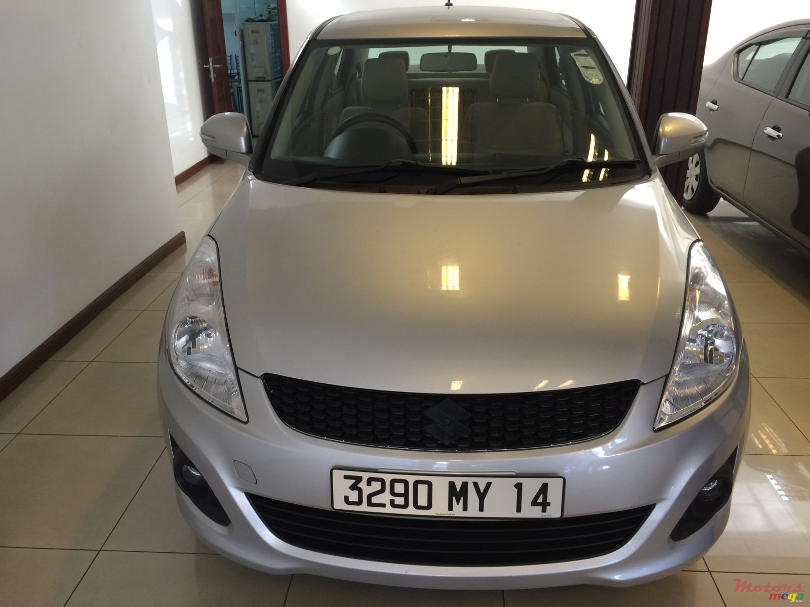 2014' Suzuki Swift Dzire photo #1