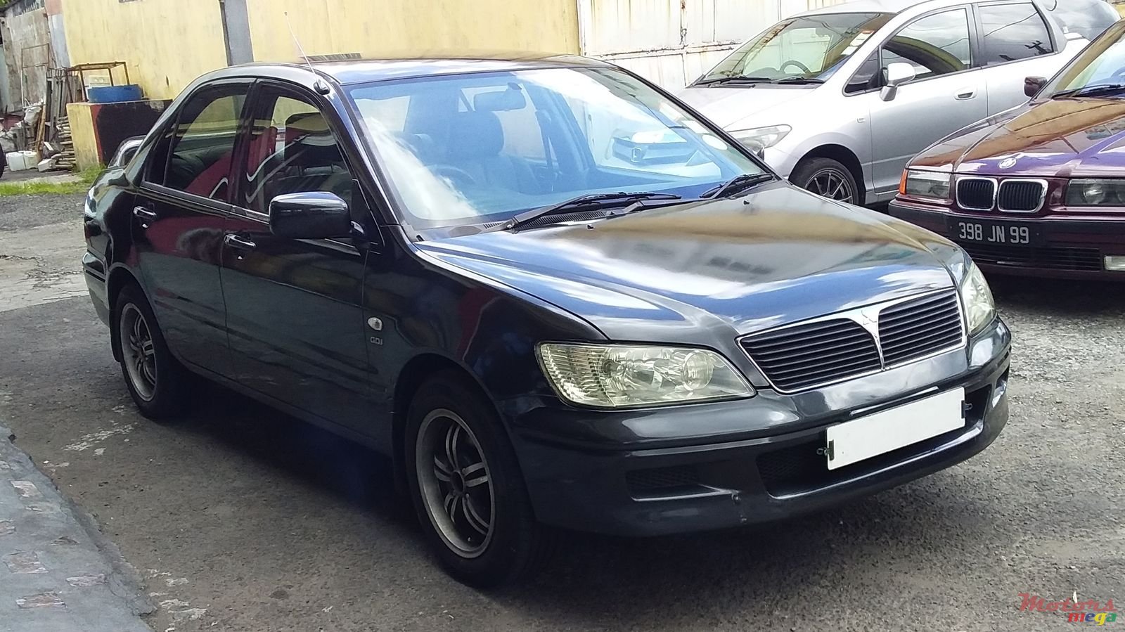 2002' Mitsubishi Lancer photo #1