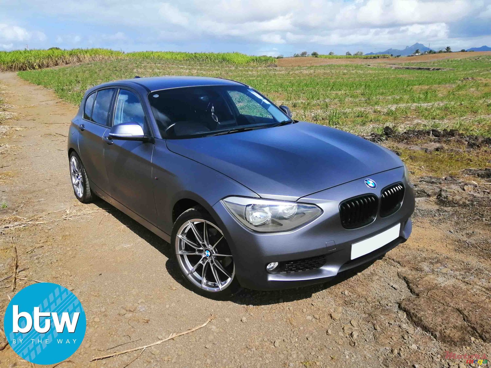 2012' BMW 116 i A photo #1