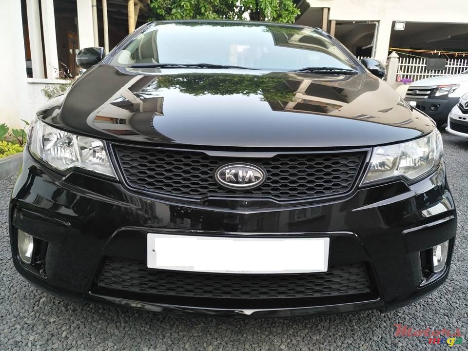 2011' Kia Cerato Coupe photo #1