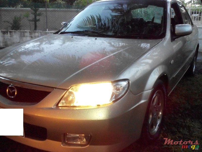 2003' Mazda 323 photo #1