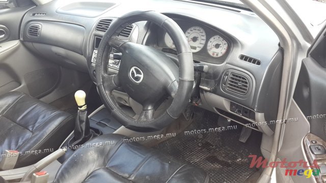 2002' Mazda 323 photo #3