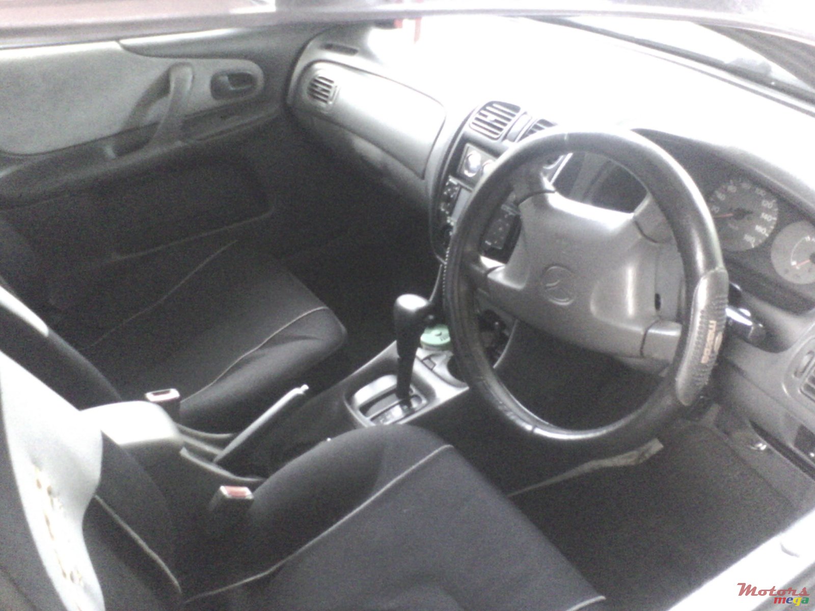 1998' Mazda 323 photo #2