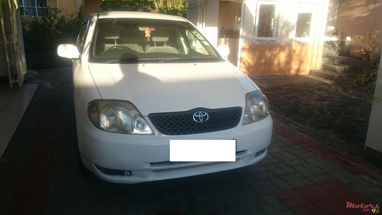 2000' Toyota Corolla NZE photo #1