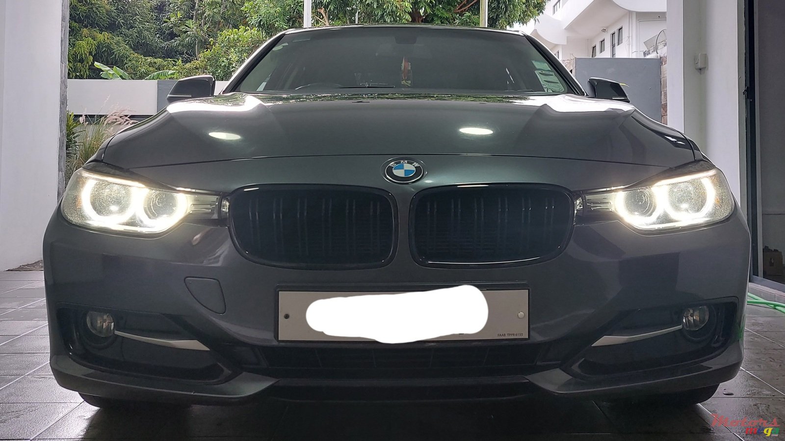 2013' BMW 316 photo #5