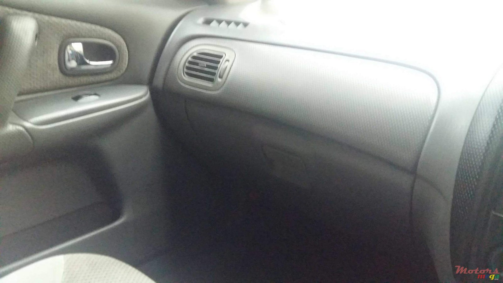 1999' Mazda 323 photo #7