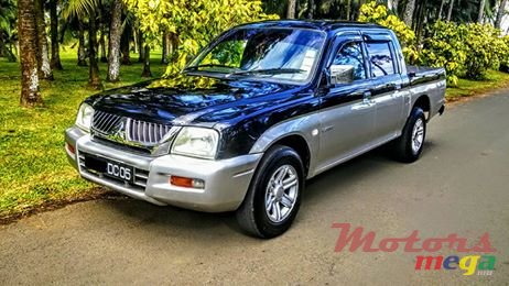 2005' Mitsubishi L200 Warrior 2.9D photo #1