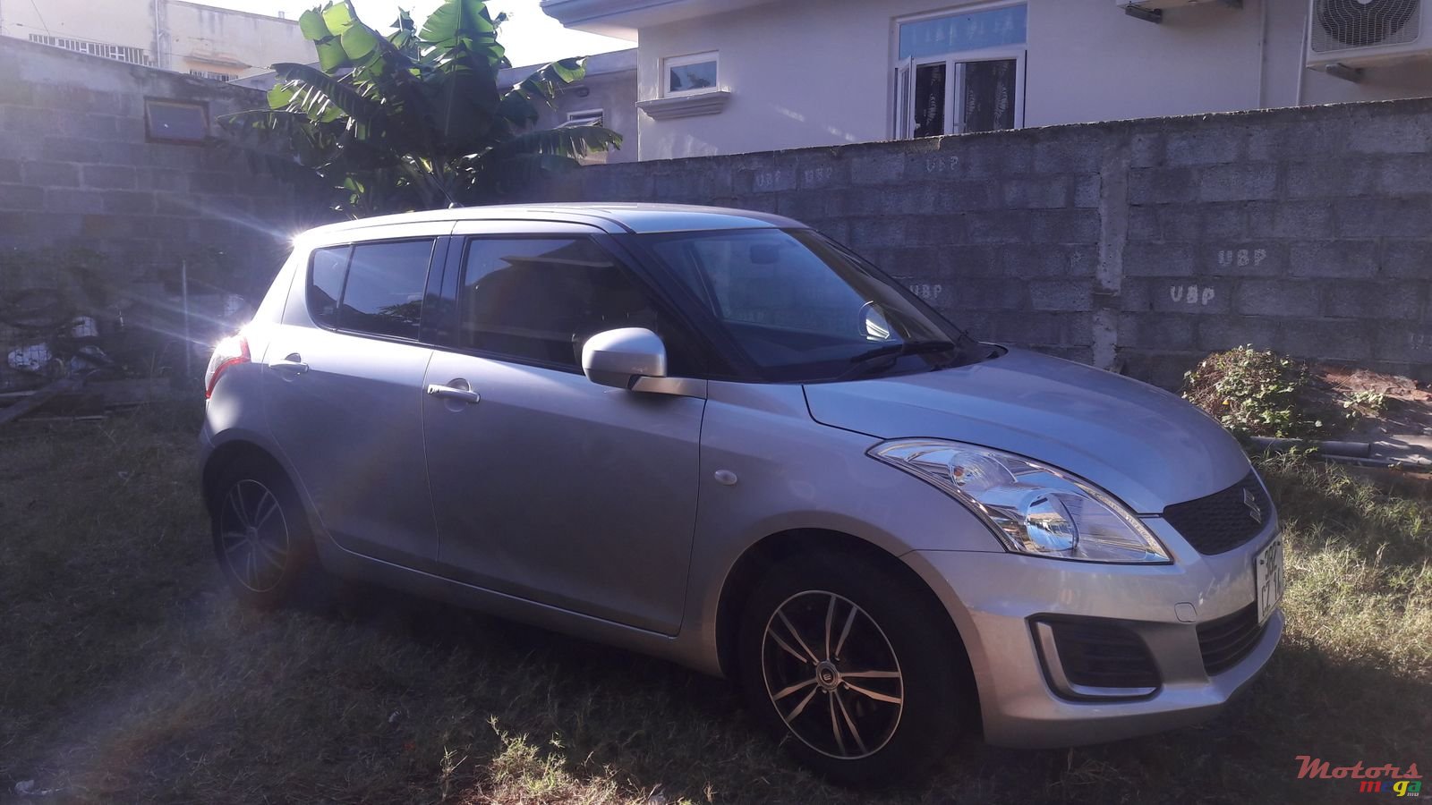 2014' Suzuki Swift photo #1