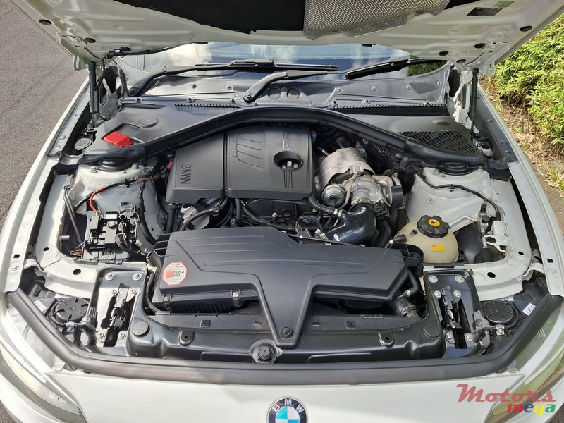 2013' BMW 1 Series M photo #1