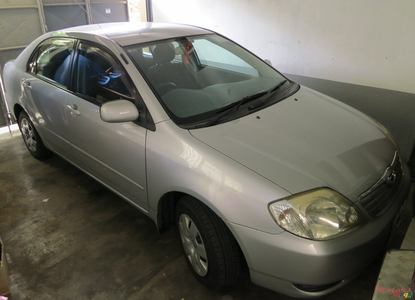 2004' Toyota Corolla photo #1